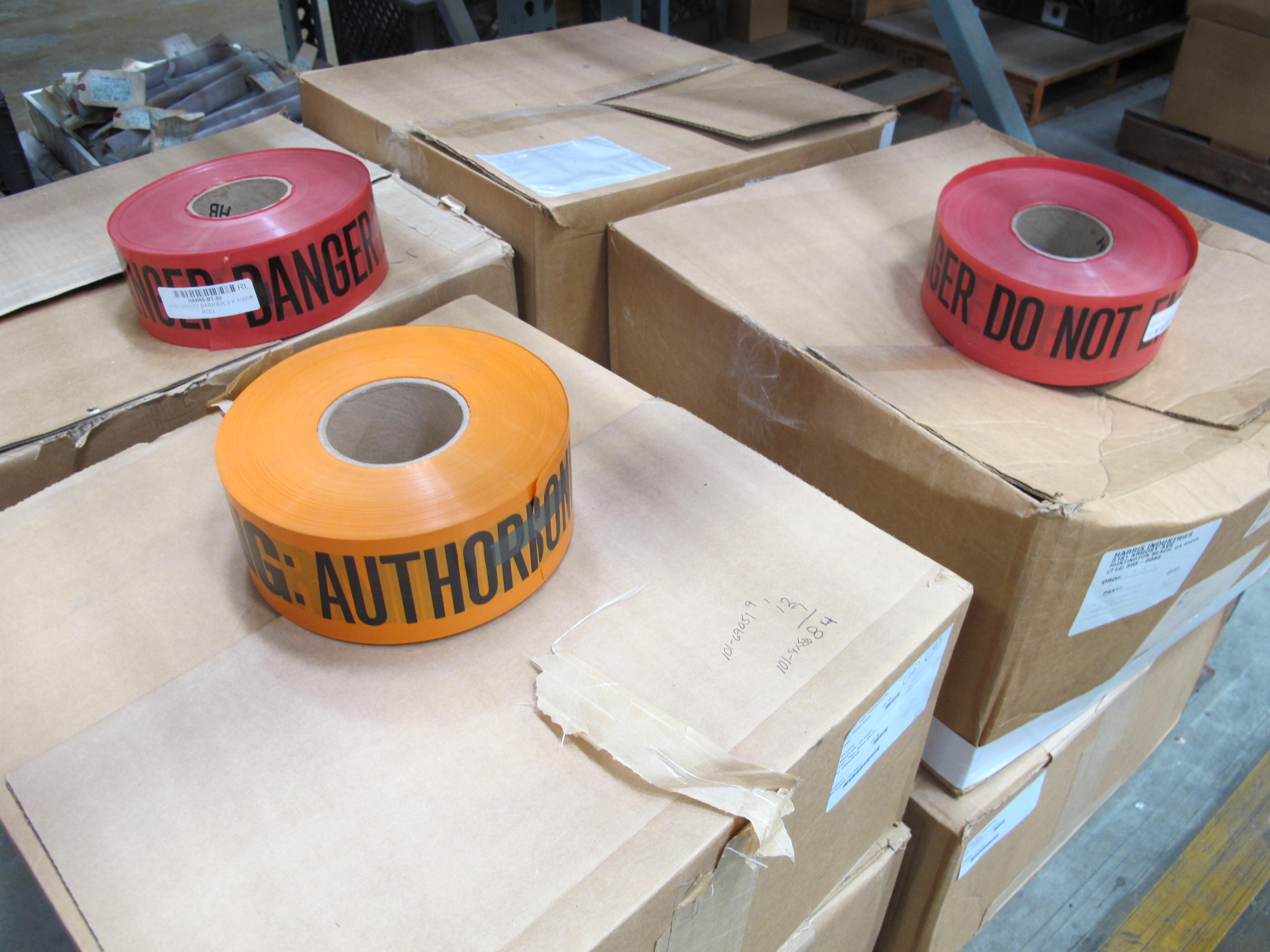 (2 PALLETS) BARRIER TAPE, (8 ROLLS) "CAUTION", (7 BOXES) "DO NOT ENTER" , (1 BOX) "AUTHORIZED PERSONNEL ONLY". LOADING & HANDLING FEE $15-4222